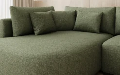 Designer Ecksofa Ando mit breiter Ottomane in Strukturstoff