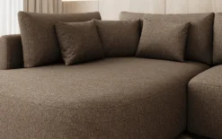 Designer Ecksofa Ando mit breiter Ottomane in Strukturstoff