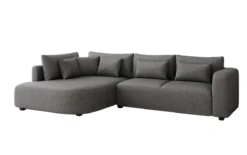 Designer Ecksofa Ando mit breiter Ottomane in Strukturstoff