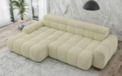 Designer Ecksofa Elaro mit elektrischer Sitzerweiterung in Bouclé