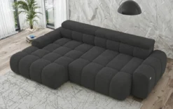 Designer Ecksofa Elaro mit elektrischer Sitzerweiterung in Bouclé