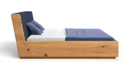 Designer Holzbett Cassian aus massiver Eiche mit Stauraum