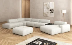 Designer Wohnlandschaft Calm mit Beistellhocker in Bouclé