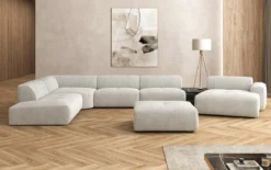Designer Wohnlandschaft Calm mit Beistellhocker in Bouclé