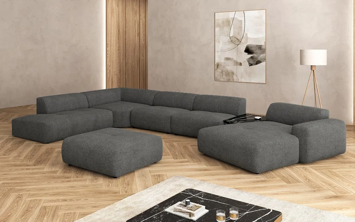 Designer Wohnlandschaft Calm mit Beistellhocker in Bouclé
