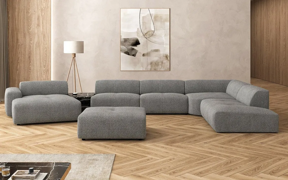 Designer Wohnlandschaft Calm mit Beistellhocker in Bouclé