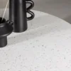 Esstisch Soreya - moderner Esstisch mit hochwertiger Terrazzo-Tischplatte