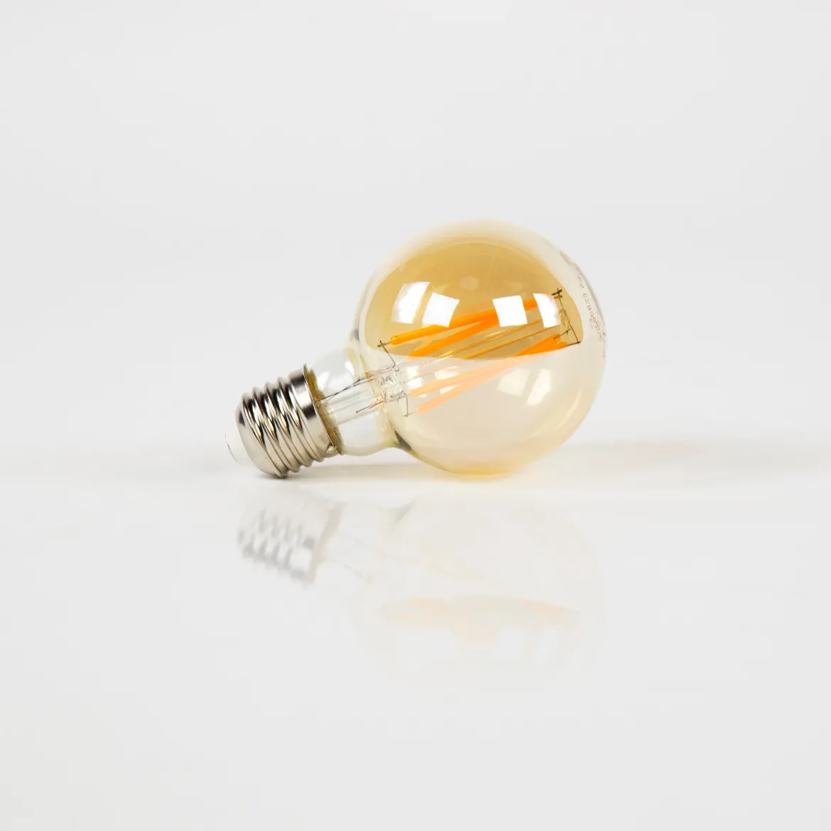 LED-Glühlampe Calyra – G70-E27 mit amberfarbenem Glas