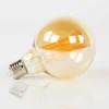 LED-Glühlampe Rara – G95-E27 mit amberfarbenem Glas