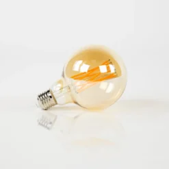 LED-Glühlampe Rara – G95-E27 mit amberfarbenem Glas