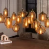 Pendelleuchte "Solaro" – mit 15 Leuchten im Rib-Glass Design und Bernsteinfarben
