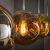 Pendelleuchte „Virelli“ – 4 Leuchten in der Metall-Farbkombination Gold, Kupfer und Chrom