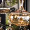 Pendelleuchte "Viretta“ – 7 Glasschirme in Karaffenform mit schwarzer Metall-Armatur
