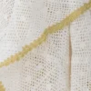 Tagesdecke Ara – Handgehäkeltes Design in Naturton