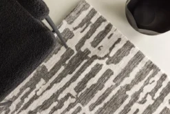 Teppich Inara – in Beige oder Grau aus Polyester & Baumwolle