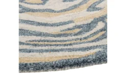 Teppich Niro – Runde Form mit organischem Muster in Braun & Blau